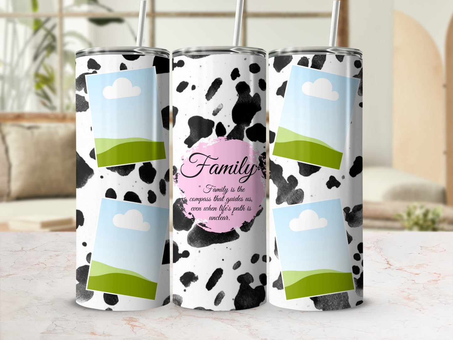 Cow print tumbler with photo placeholders and the quote "Family is the compass that guides us."