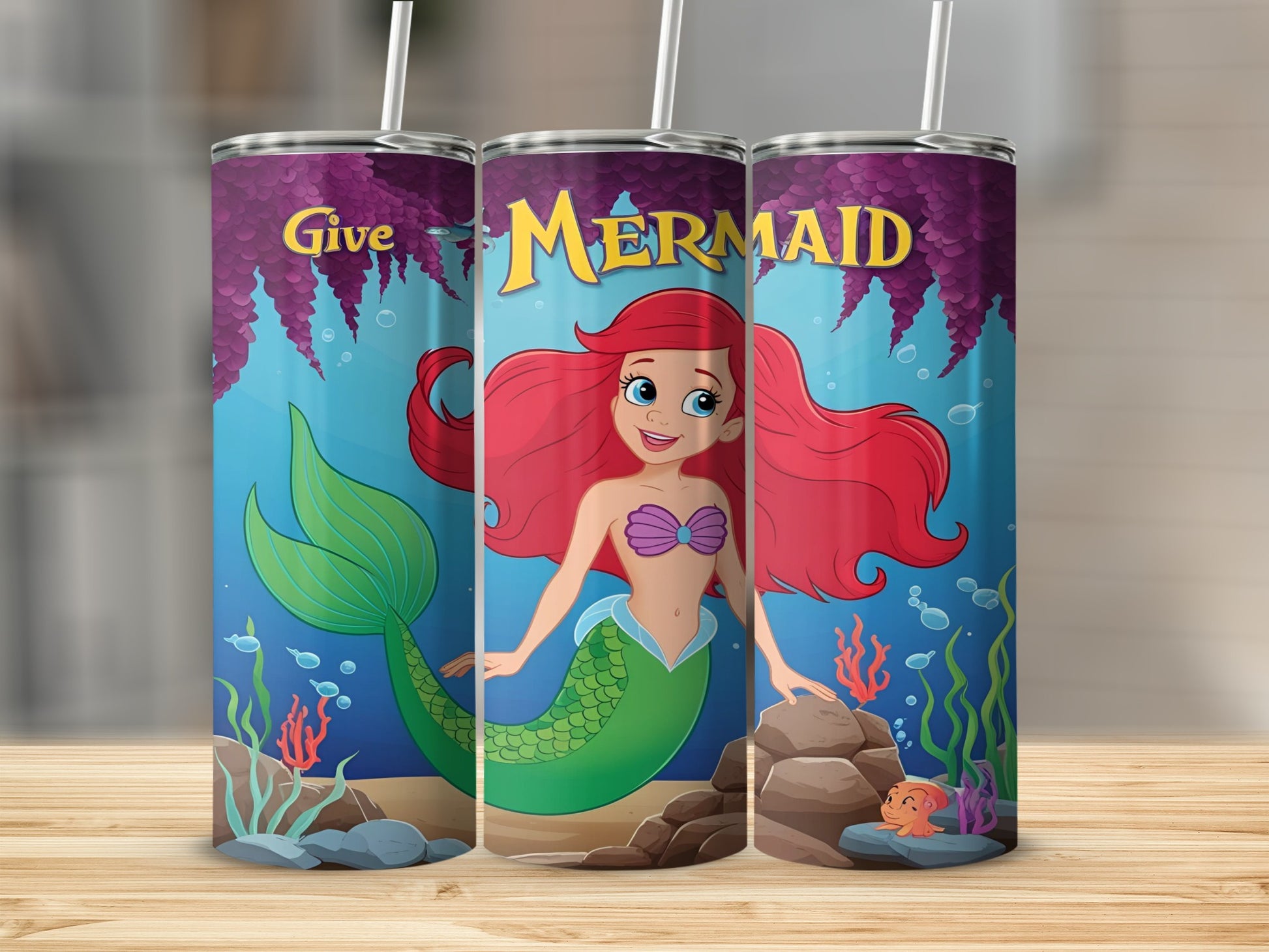Mermaid with red hair and green tail, "Give Mermaid" text, under the sea.