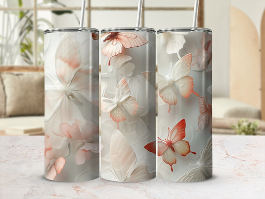 Three tall tumblers with delicate butterflies and floral designs.