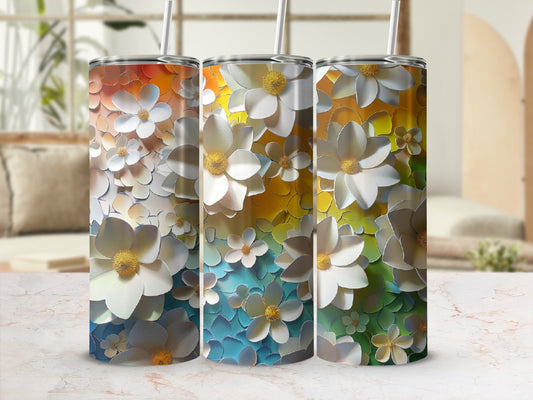 Three tumblers with a gradient floral design featuring white and yellow flowers.