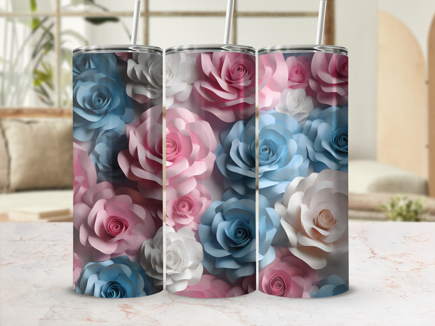 Three tumblers with a floral pattern of pink, blue, and white roses.
