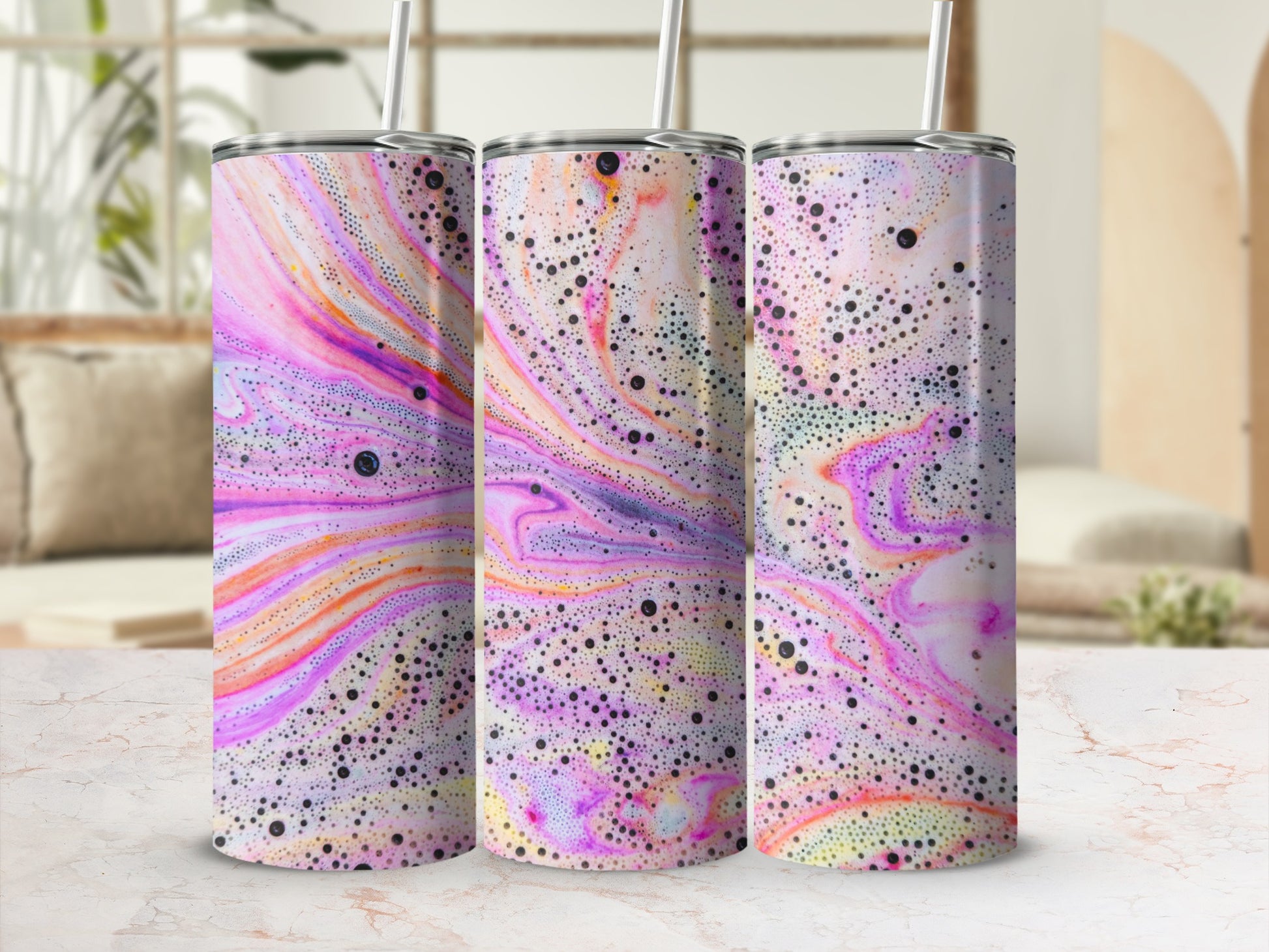 Three tumblers with a swirling pink, purple, and yellow abstract design.