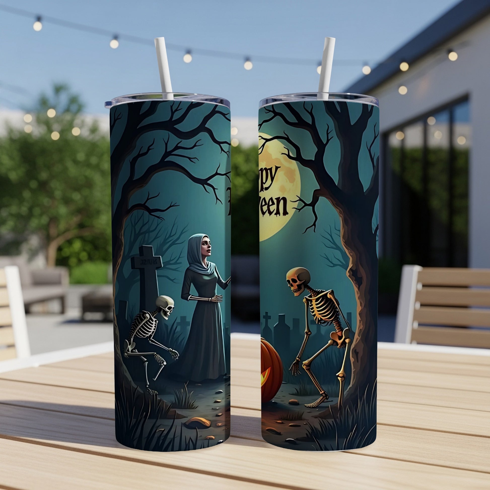Two tumblers with a Halloween cemetery scene featuring skeletons and the text "Happy Halloween".