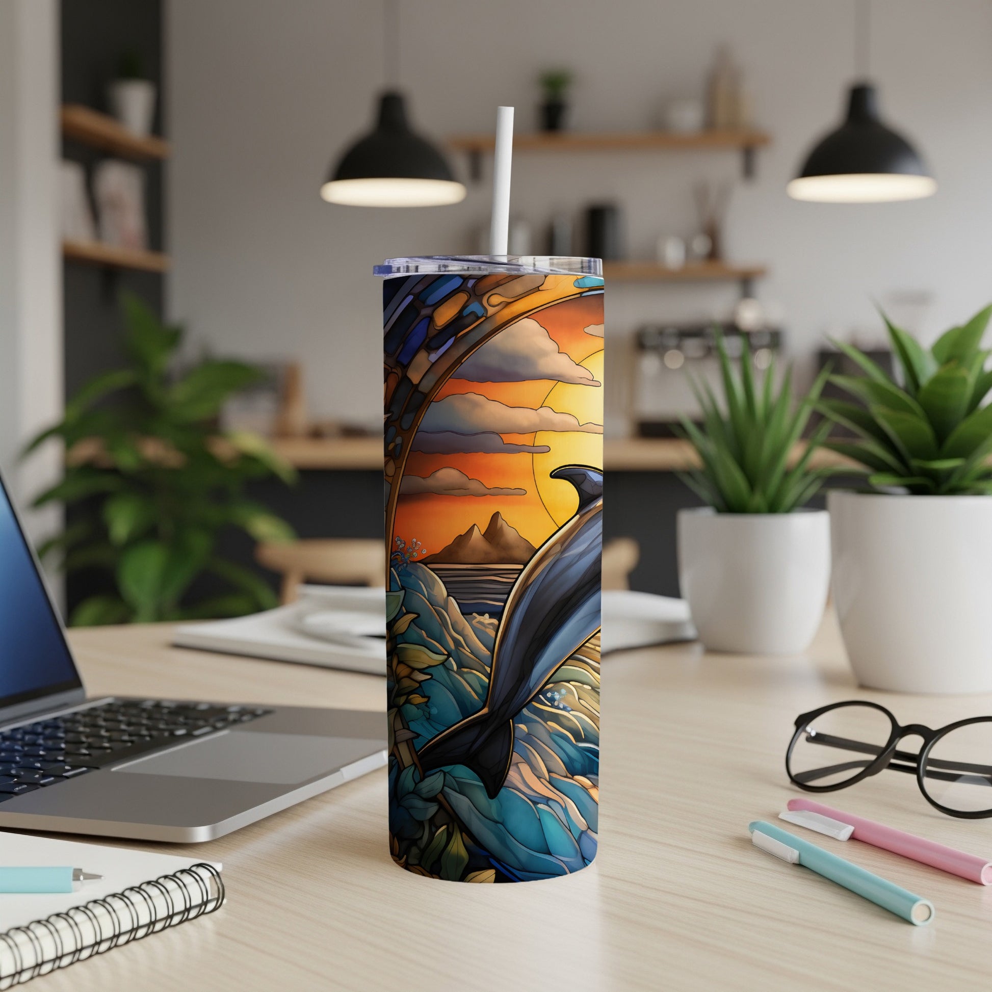 Dolphin leaping from waves, stained glass art on a white tumbler.