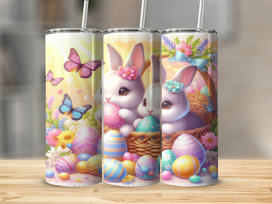 Three Easter-themed tumblers featuring bunnies and colorful eggs.