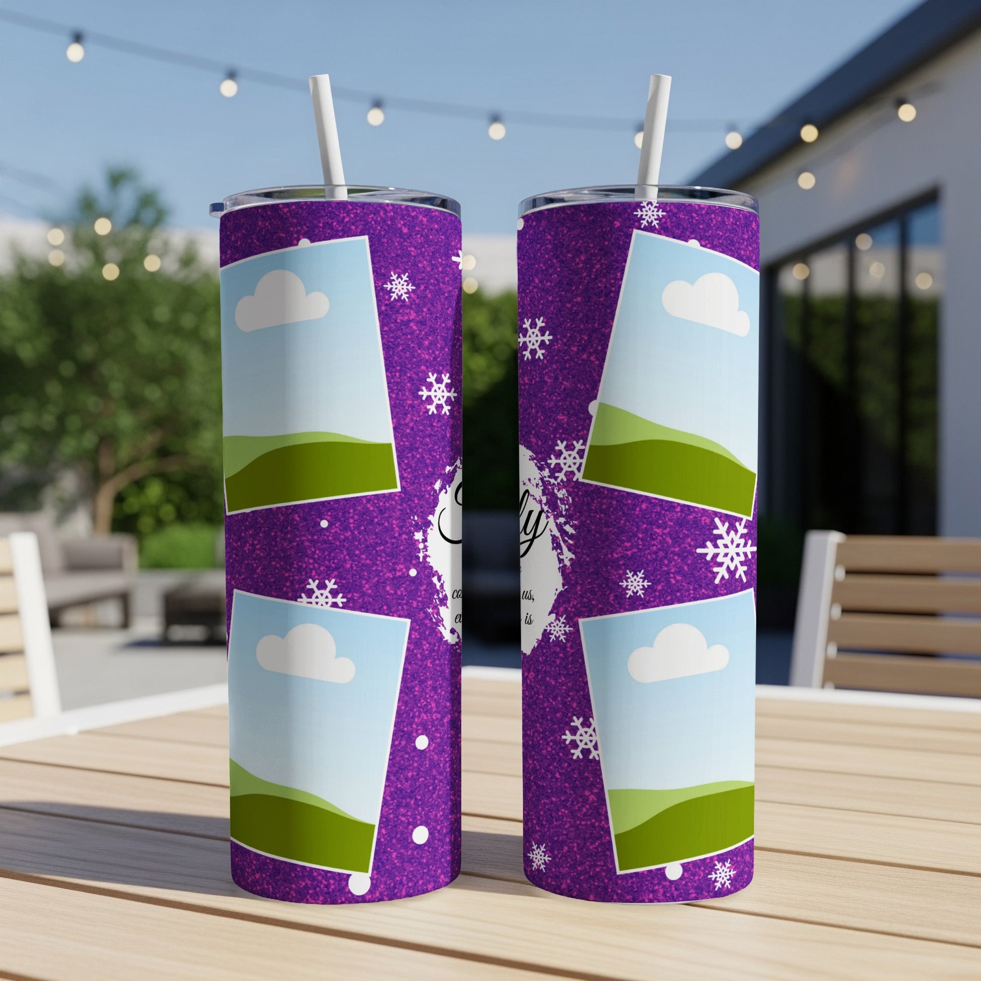Purple tumblers with photo frames, snowflakes, and text on an outdoor table.
