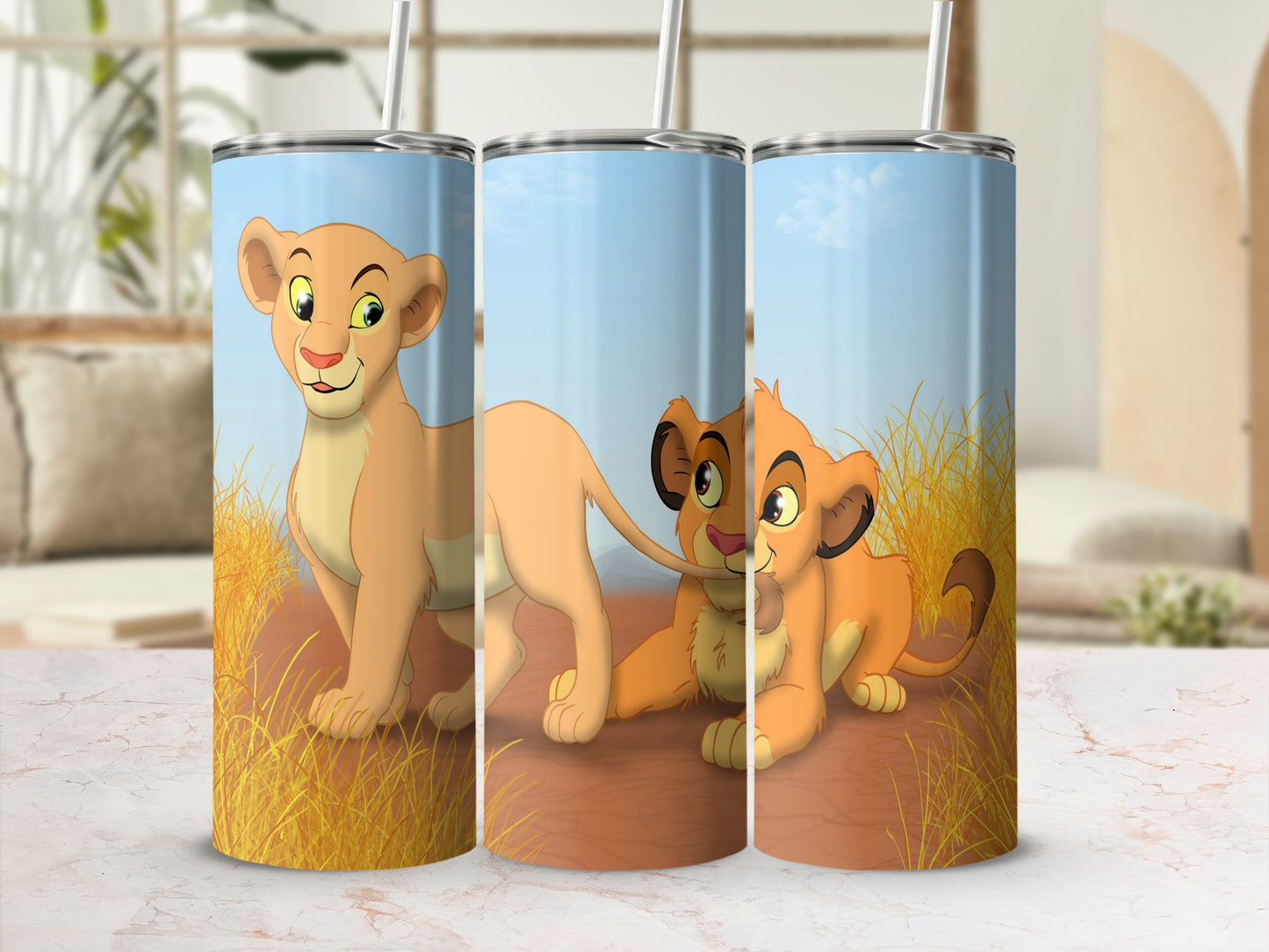 Three Simba and Nala tumblers with cartoon lion cubs in grassy savanna scene.