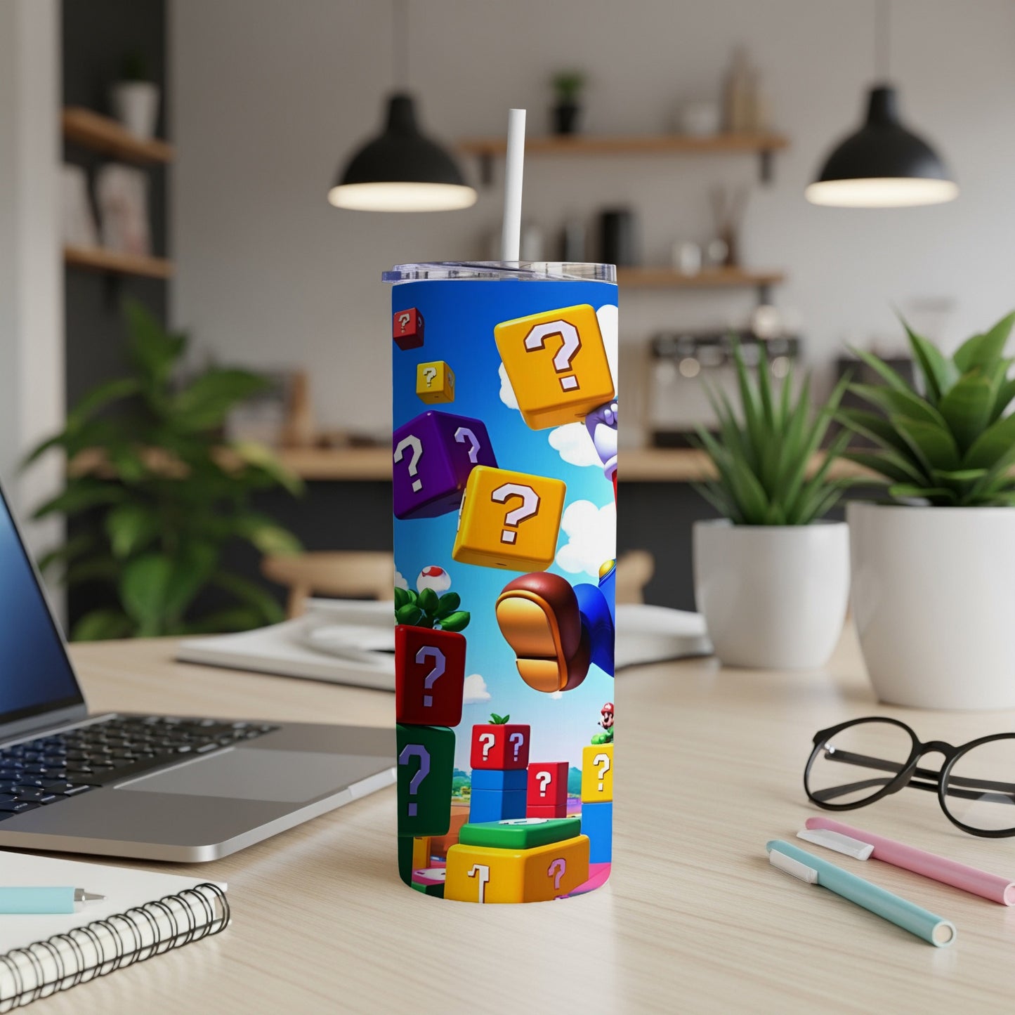 Super Mario question mark blocks and character on a blue tumbler.