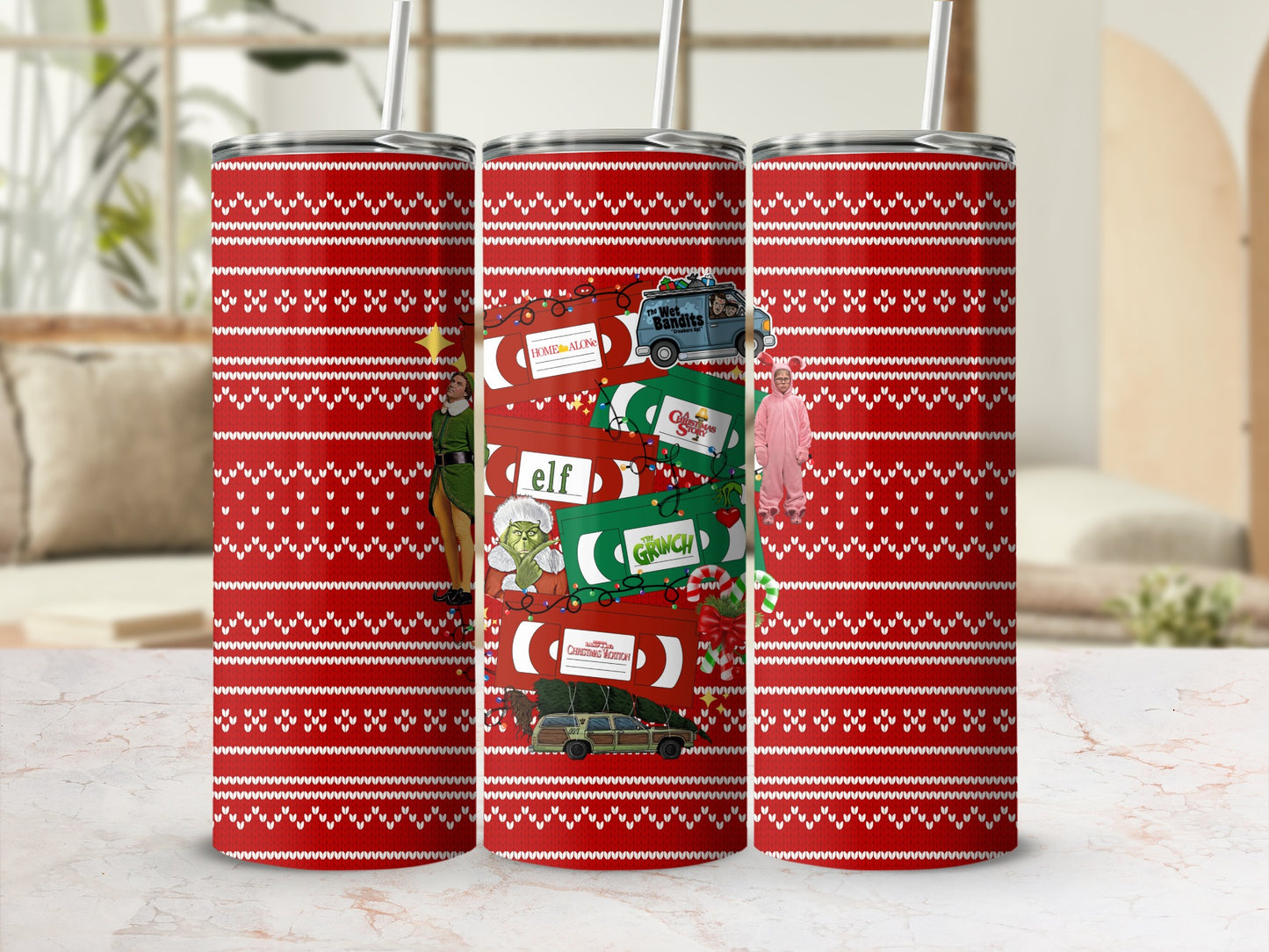 Christmas-themed tumblers with Home Alone, Elf, and Grinch movie motifs.