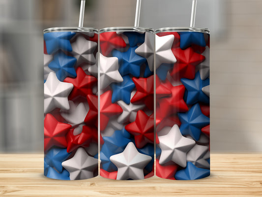 Three tumblers with red, white, and blue stars pattern and straws.