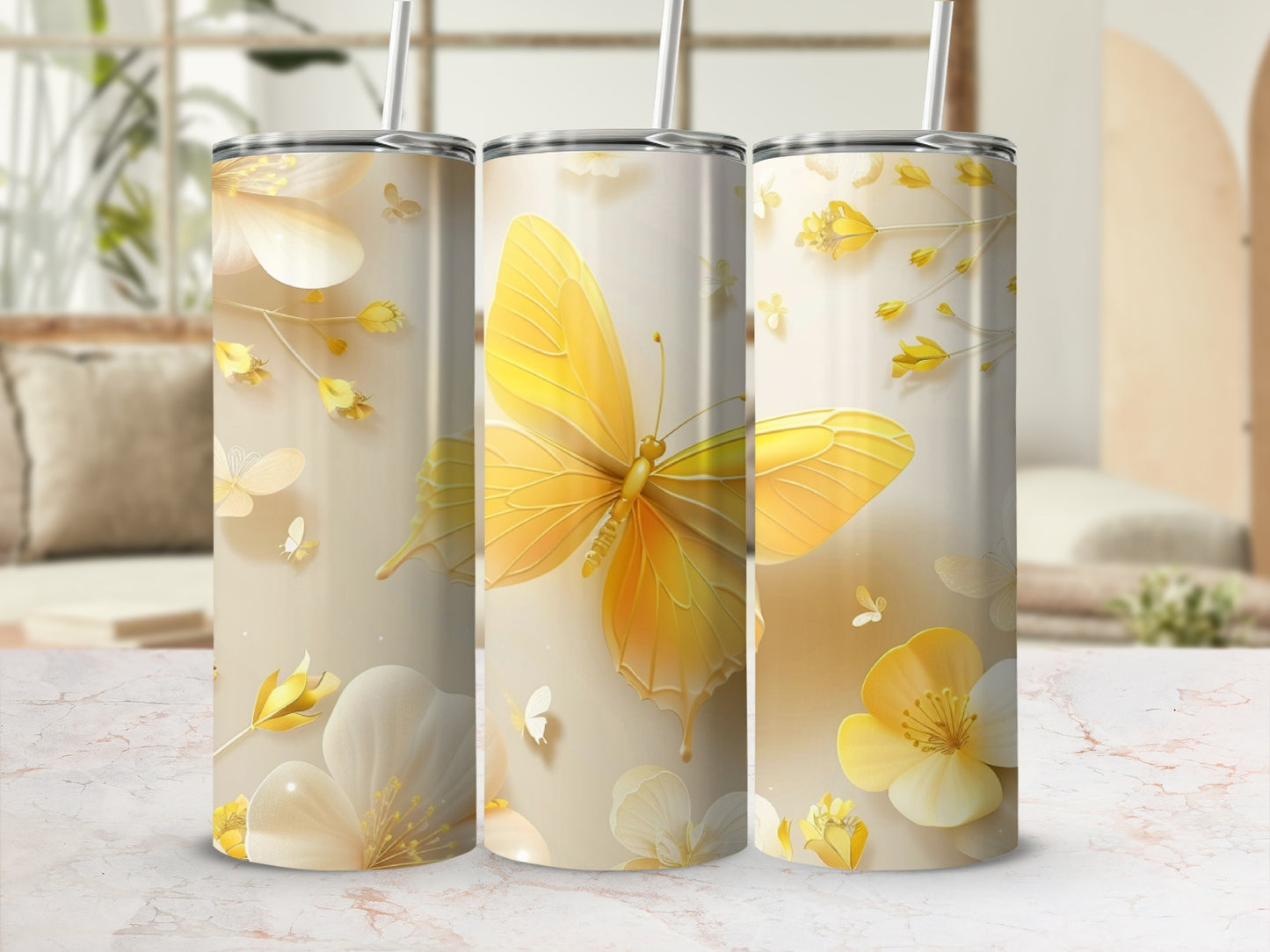 Three tall tumblers featuring a yellow butterfly and floral design.