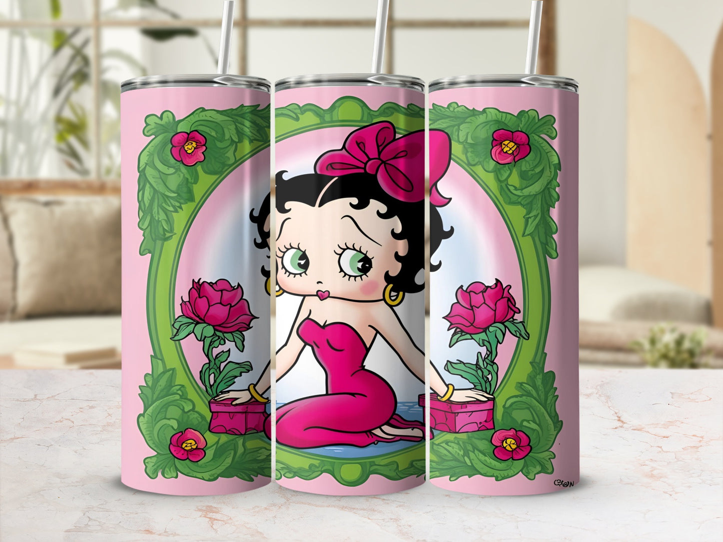 Betty Boop in pink dress with flowers and bows in ornate frame.