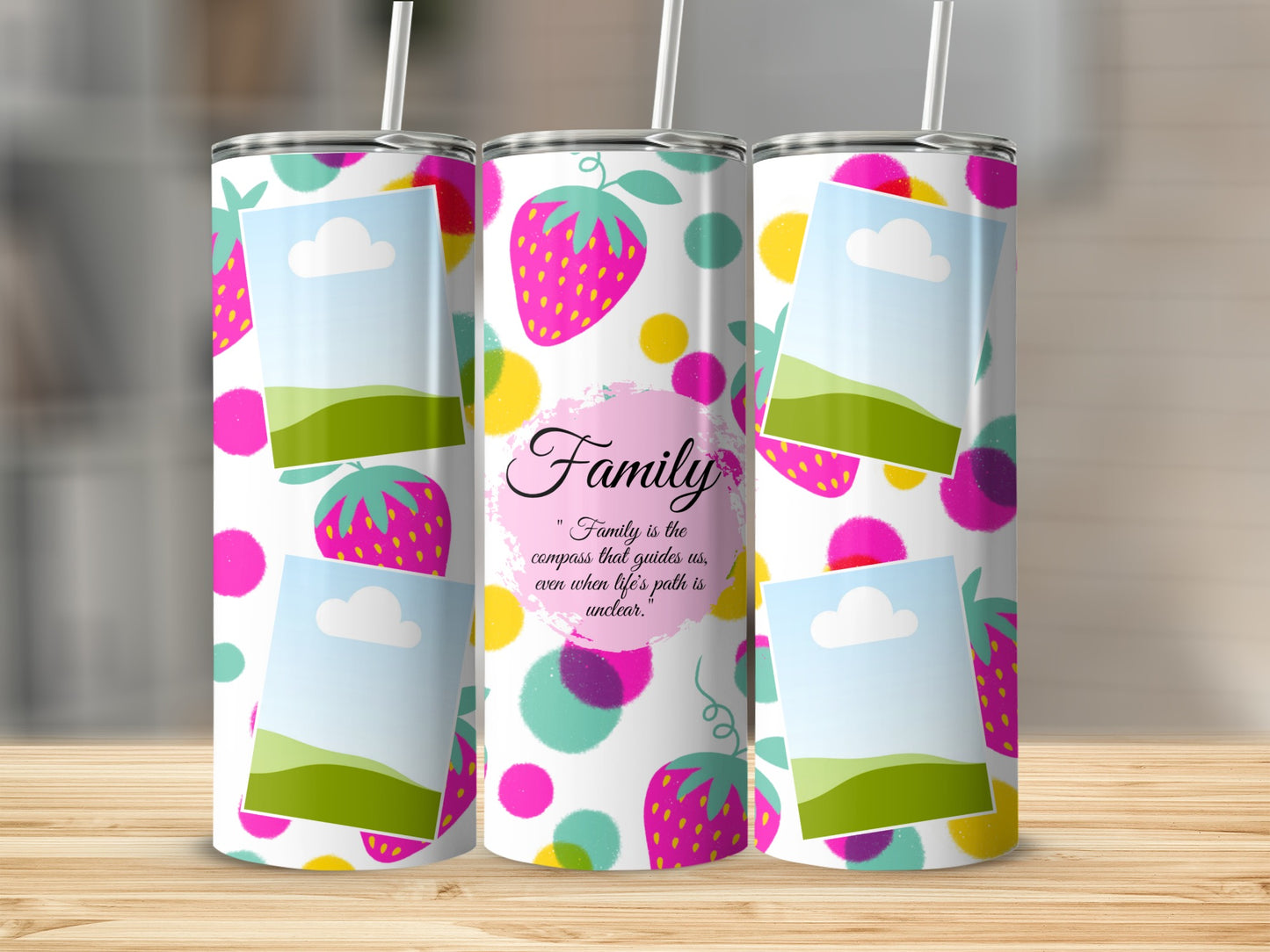Tumbler with strawberries, polka dots, photo frames, and the quote "Family is the compass..."