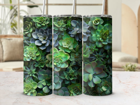 Three tumblers with a dense succulent plant pattern on a marble countertop.