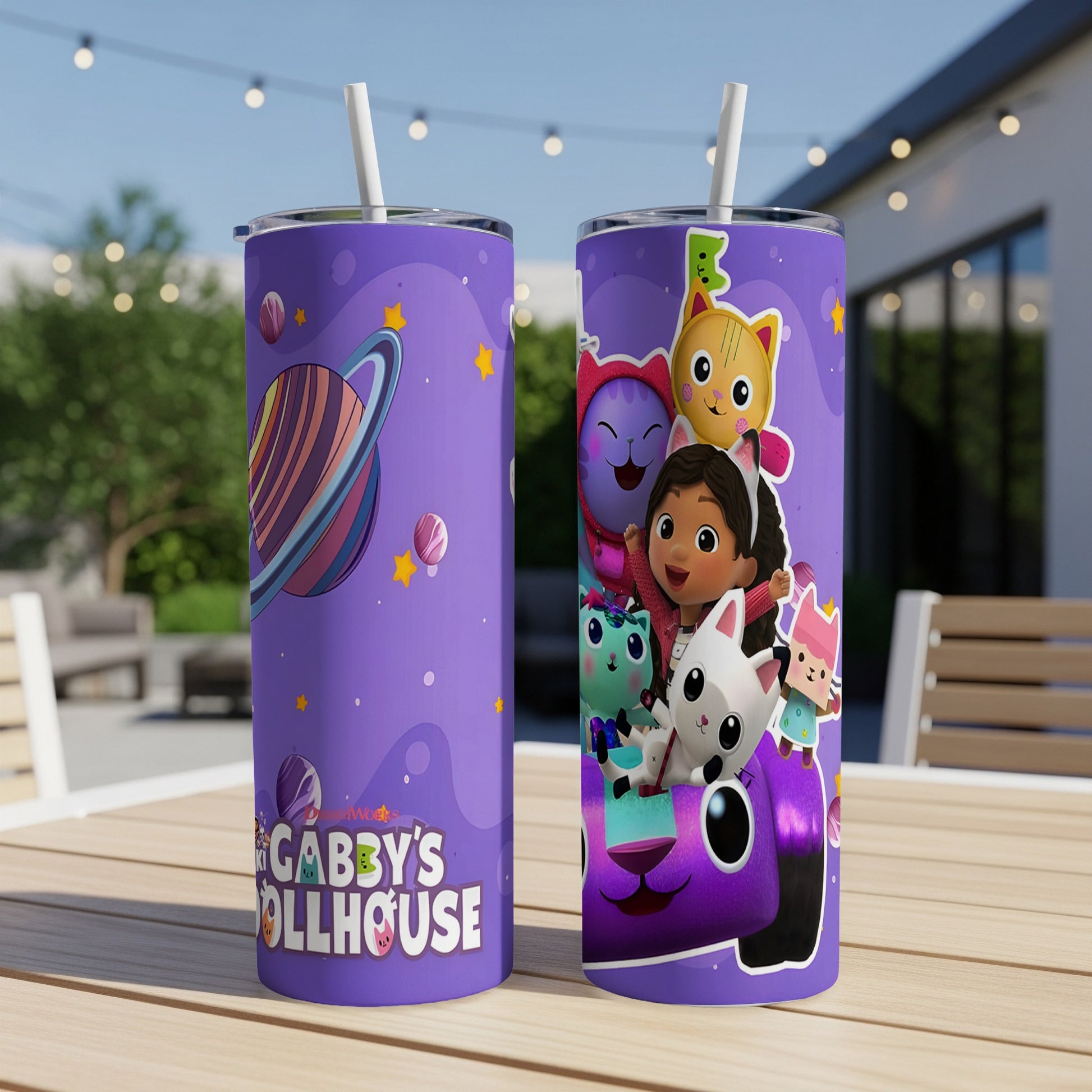 Gabby's Dollhouse tumbler with characters on a purple background.