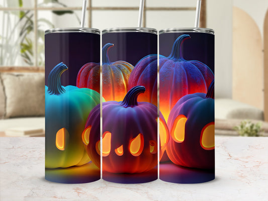 Three glowing carved pumpkins in purple, teal, and orange hues.