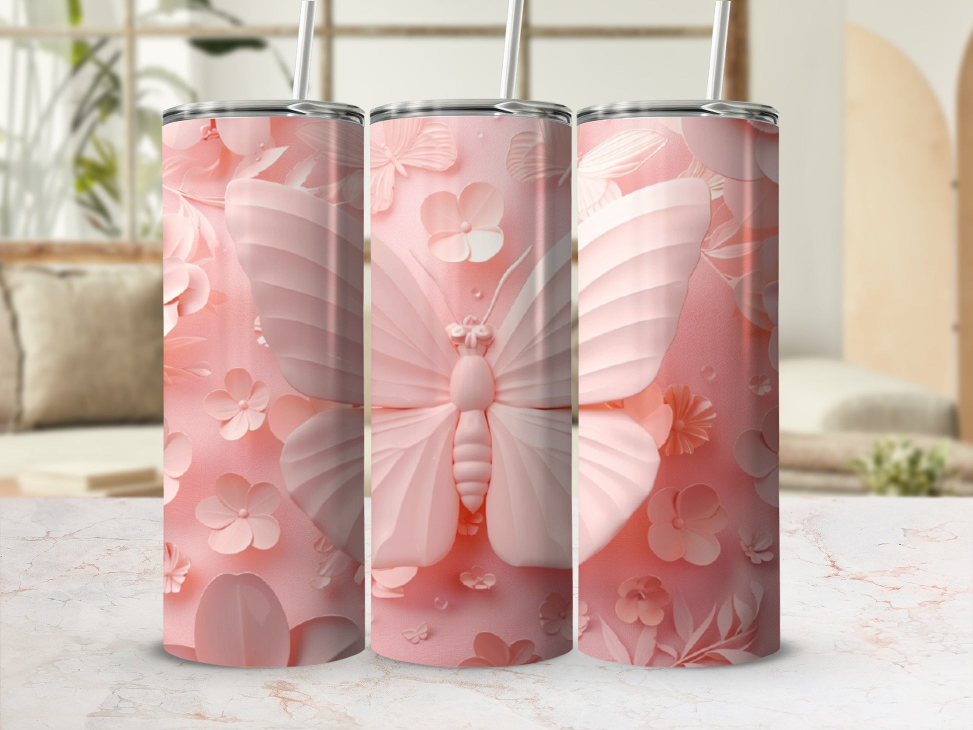 Pink butterfly and floral embossed 30 oz tumbler with straw.