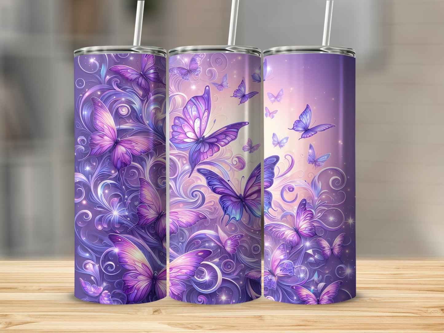Three purple tumblers with iridescent butterfly and swirling floral designs.
