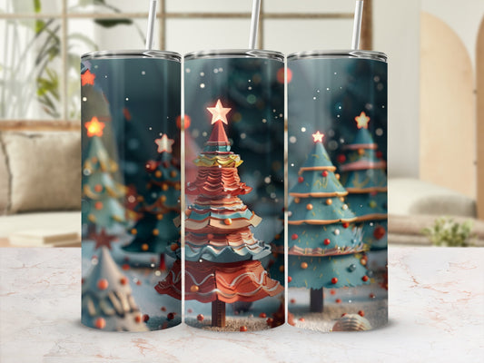 Christmas tree tumbler with a festive pattern on a marble surface.