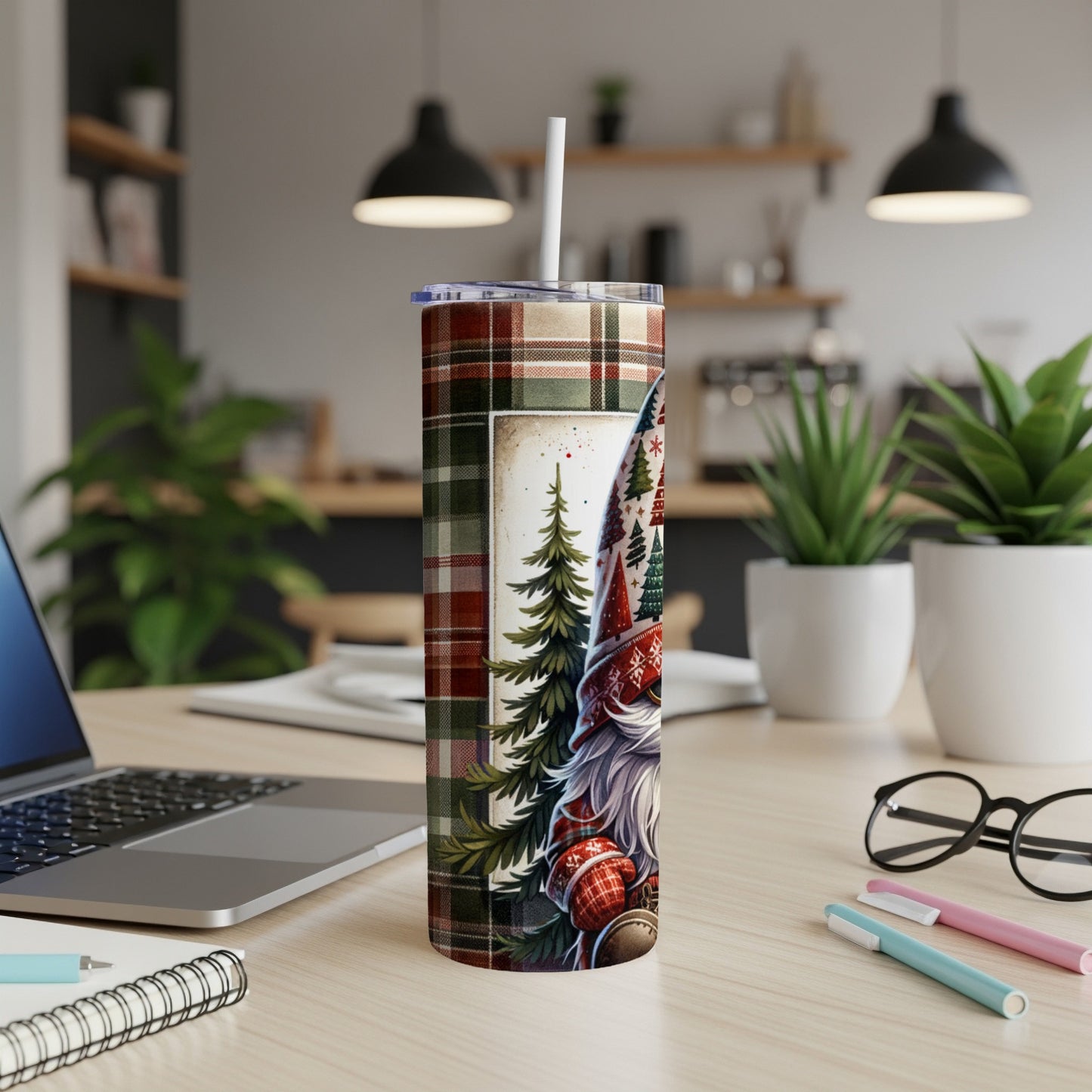 Christmas gnome tumbler with plaid pattern and pine trees.