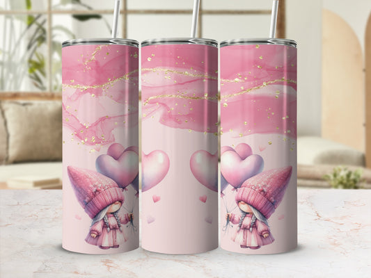 Pink marble tumbler with gnome design and pink hearts.