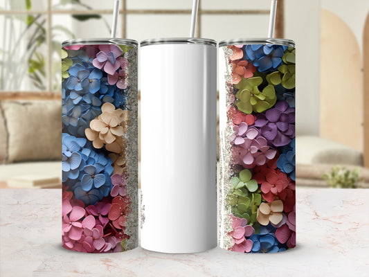 Two tumblers, one with colorful hydrangea flowers, the other blank.