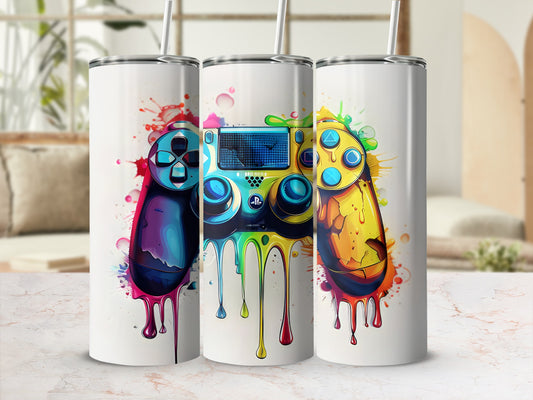 Three tumblers featuring colorful video game controller designs with dripping paint effects.