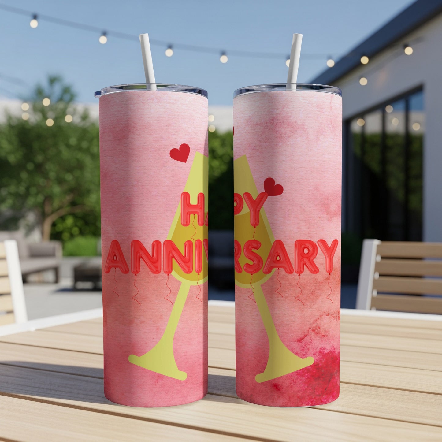 Two tall tumblers with "Happy Anniversary" balloons and champagne glasses design.