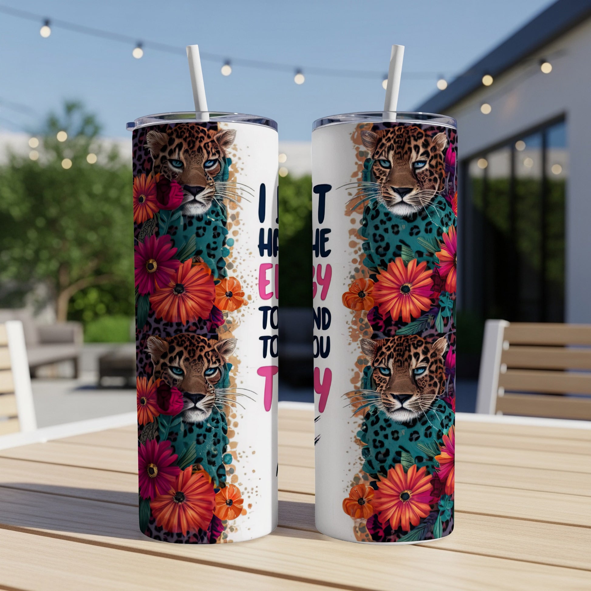 Leopard print tumbler with floral accents and text "I have a lot to say to you".