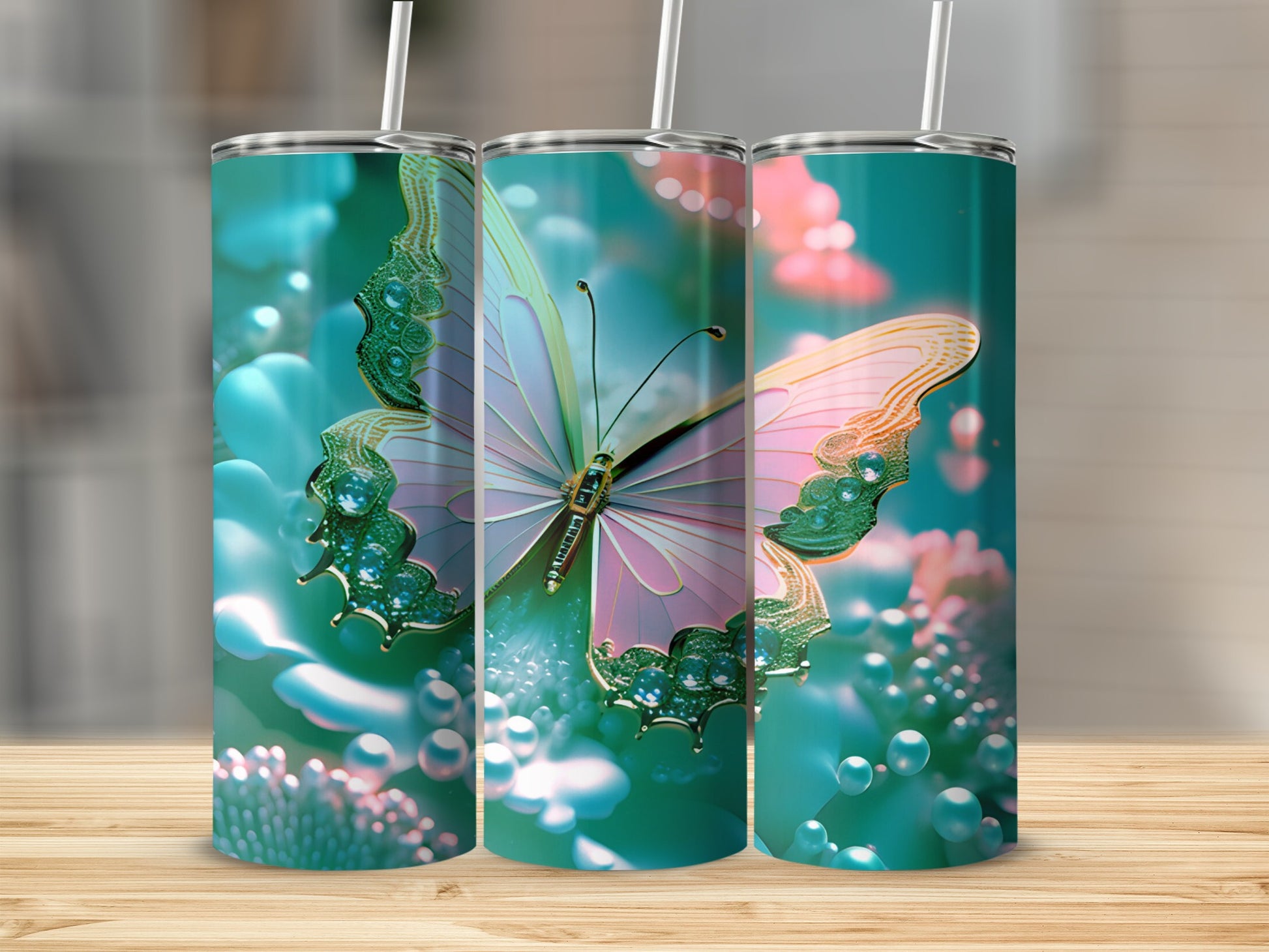 Teal tumbler with a pink and green butterfly and floral accents.