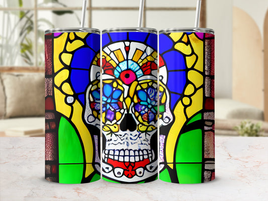 Three tumblers with colorful stained-glass sugar skull designs.
