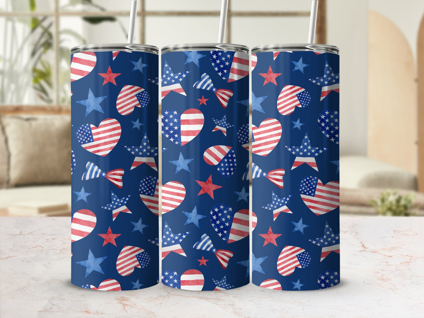 Three tumblers with a navy blue background and patriotic stars and heart pattern.