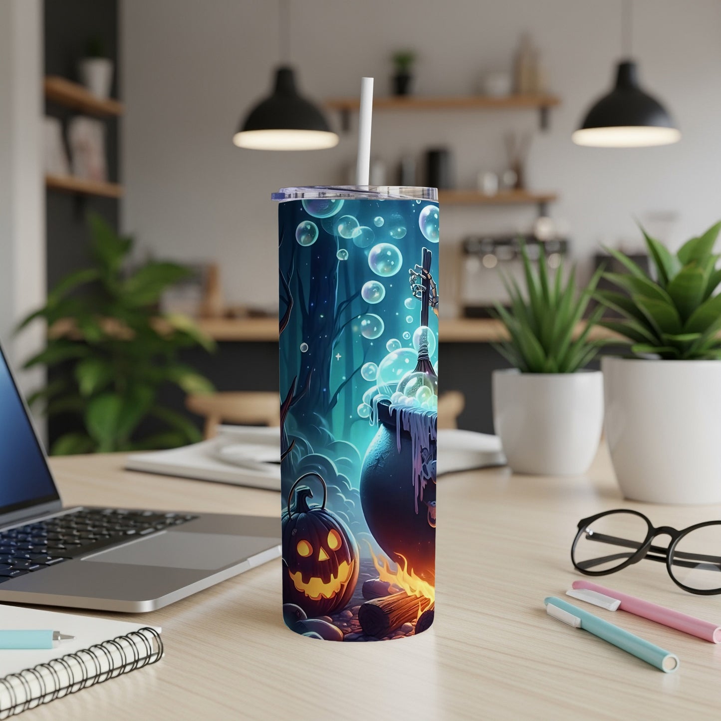 Halloween tumbler with spooky cauldron, pumpkin, and bubbles design.