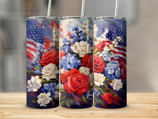Three tumblers with American flags and red, white, and blue flowers.