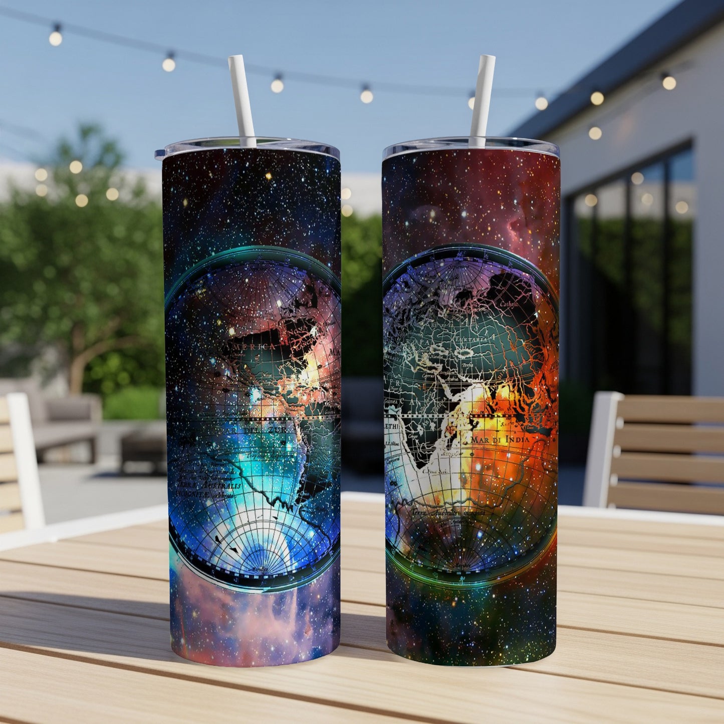 Two tumblers with a celestial map design featuring Earth and stars.