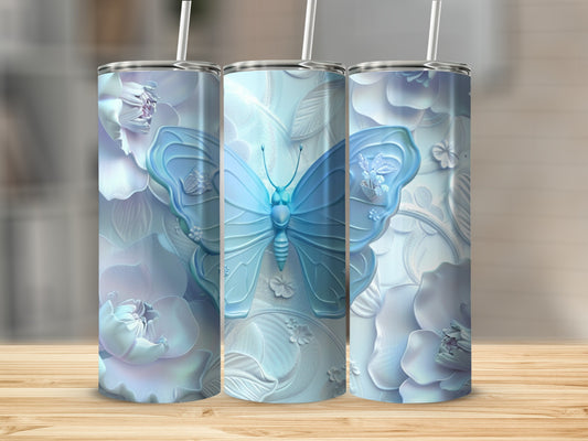 Three tumblers with pale blue butterflies and floral designs.