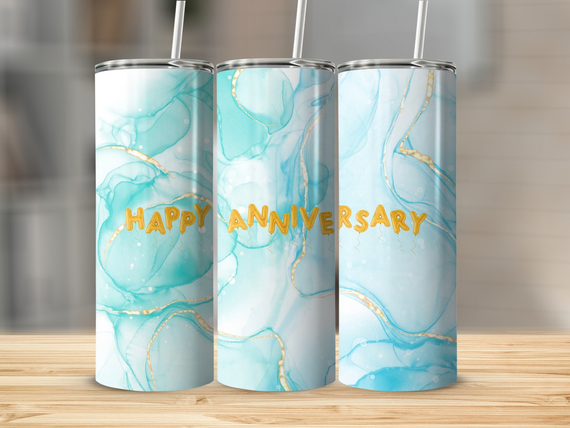 Tall tumblers with marbled aqua and gold design, "HAPPY ANNIVERSARY" text.