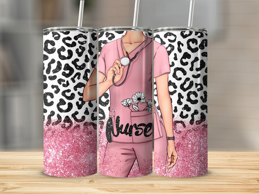 Pink nurses scrub top and pants with leopard print and glitter accents.
