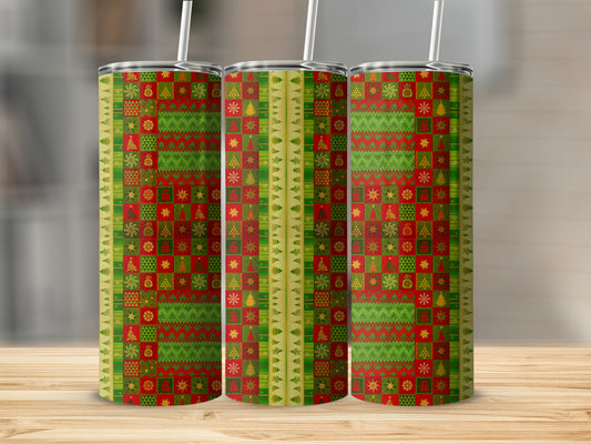 Three Christmas-themed tumblers with festive patterns of trees and snowflakes.