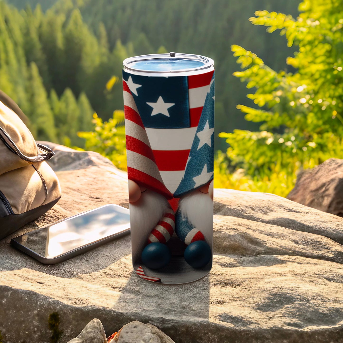 Two gnomes in American flag hats and striped socks hold an American flag.