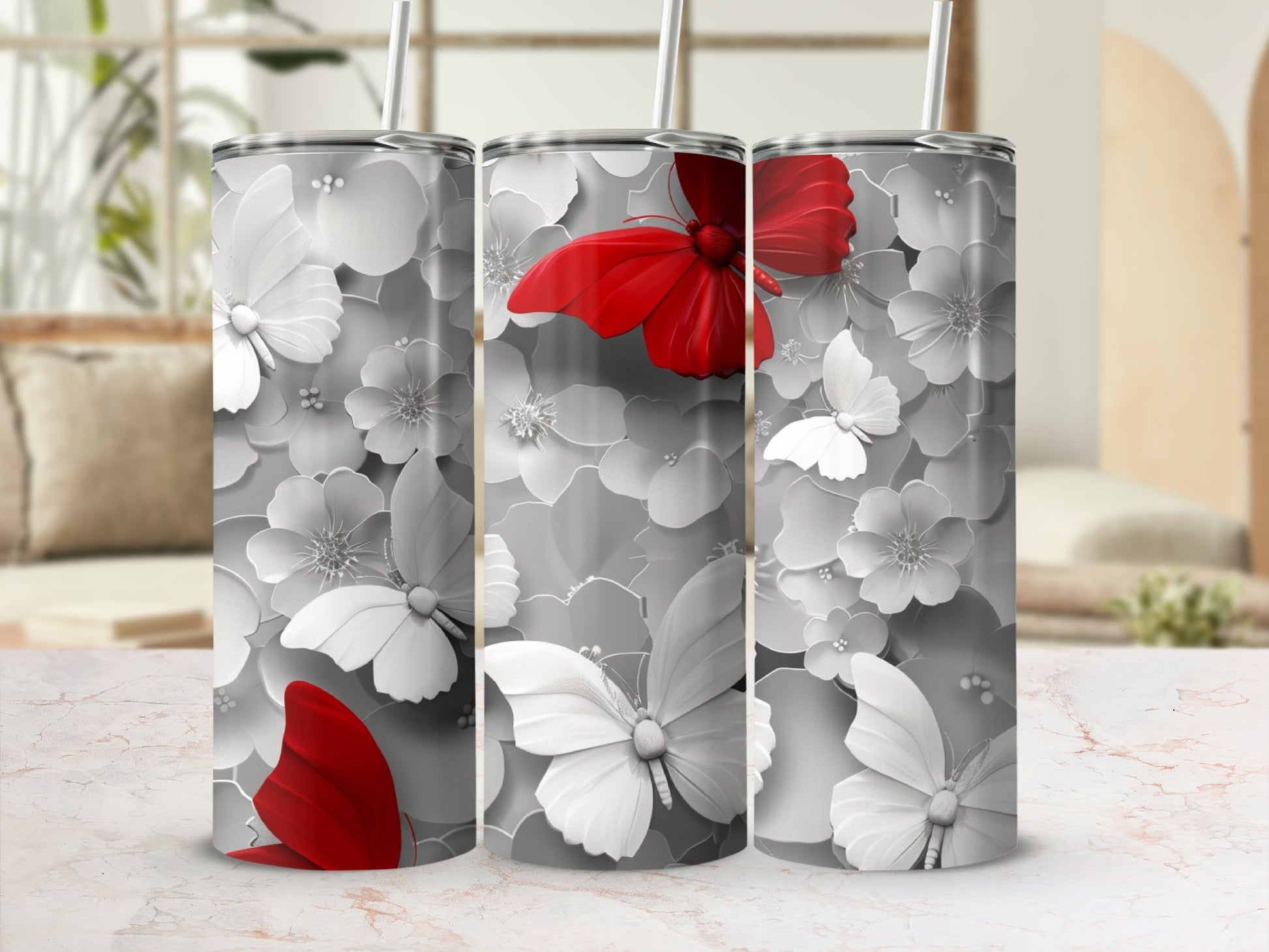 White and red butterflies on a floral patterned tumbler.