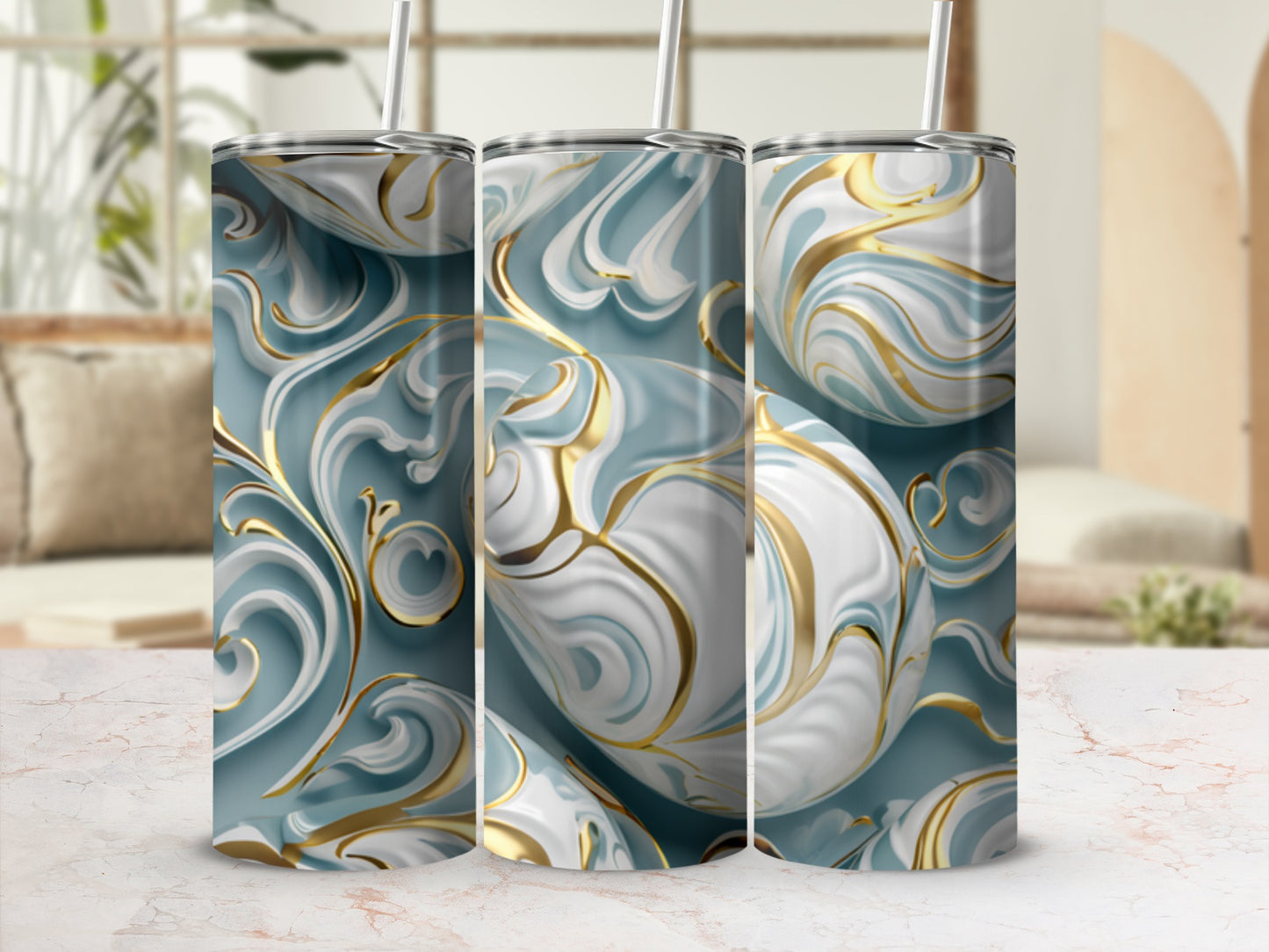 Three tumblers with a swirling blue, white, and gold abstract pattern.