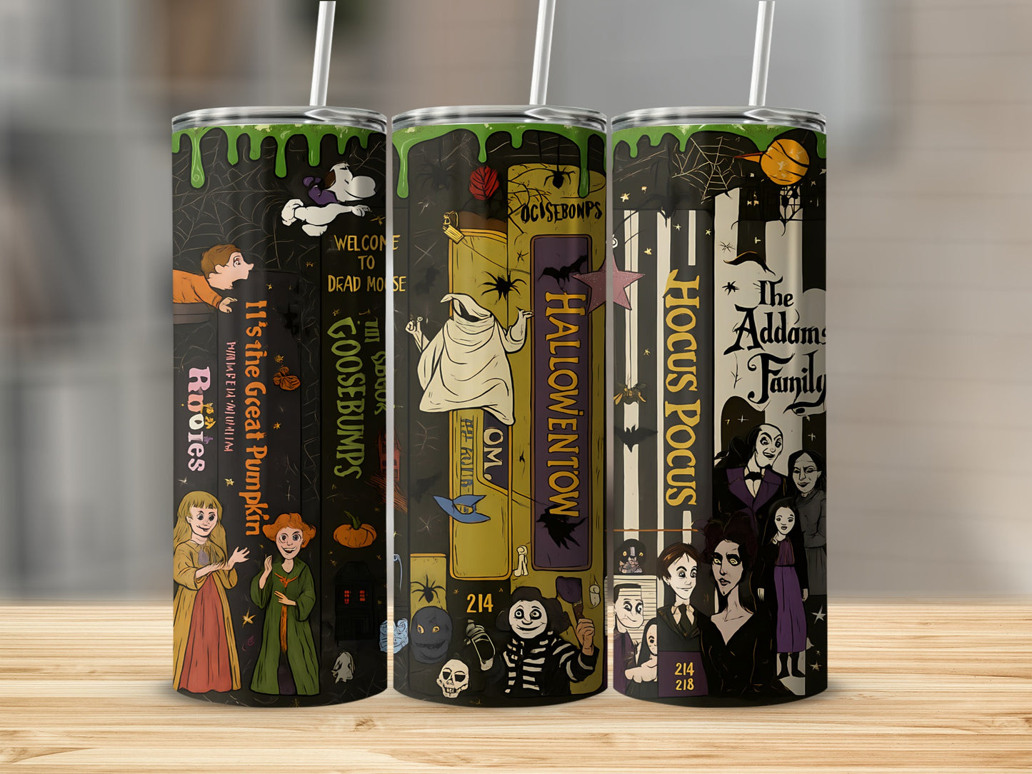 Three tumblers with Halloween-themed designs featuring Hocus Pocus and The Addams Family.