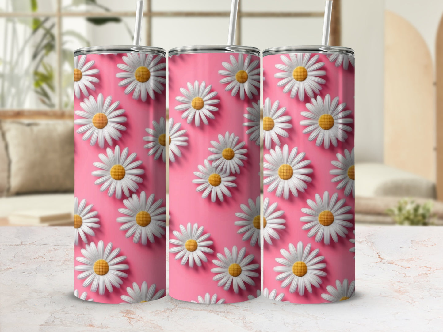 Three tumblers with a repeating daisy pattern on a pink background.