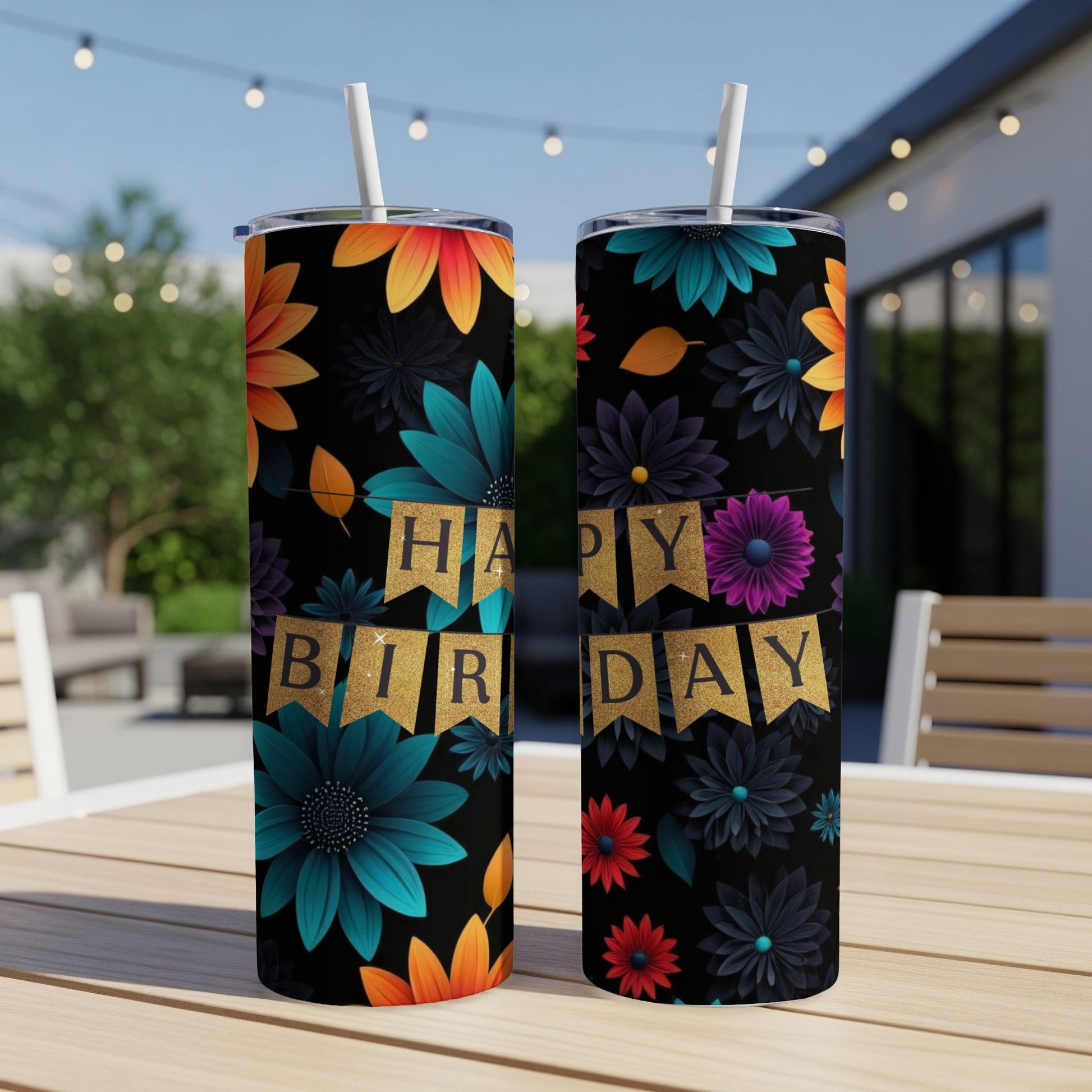 Black tumblers with colorful floral patterns and "Happy Birthday" banner.
