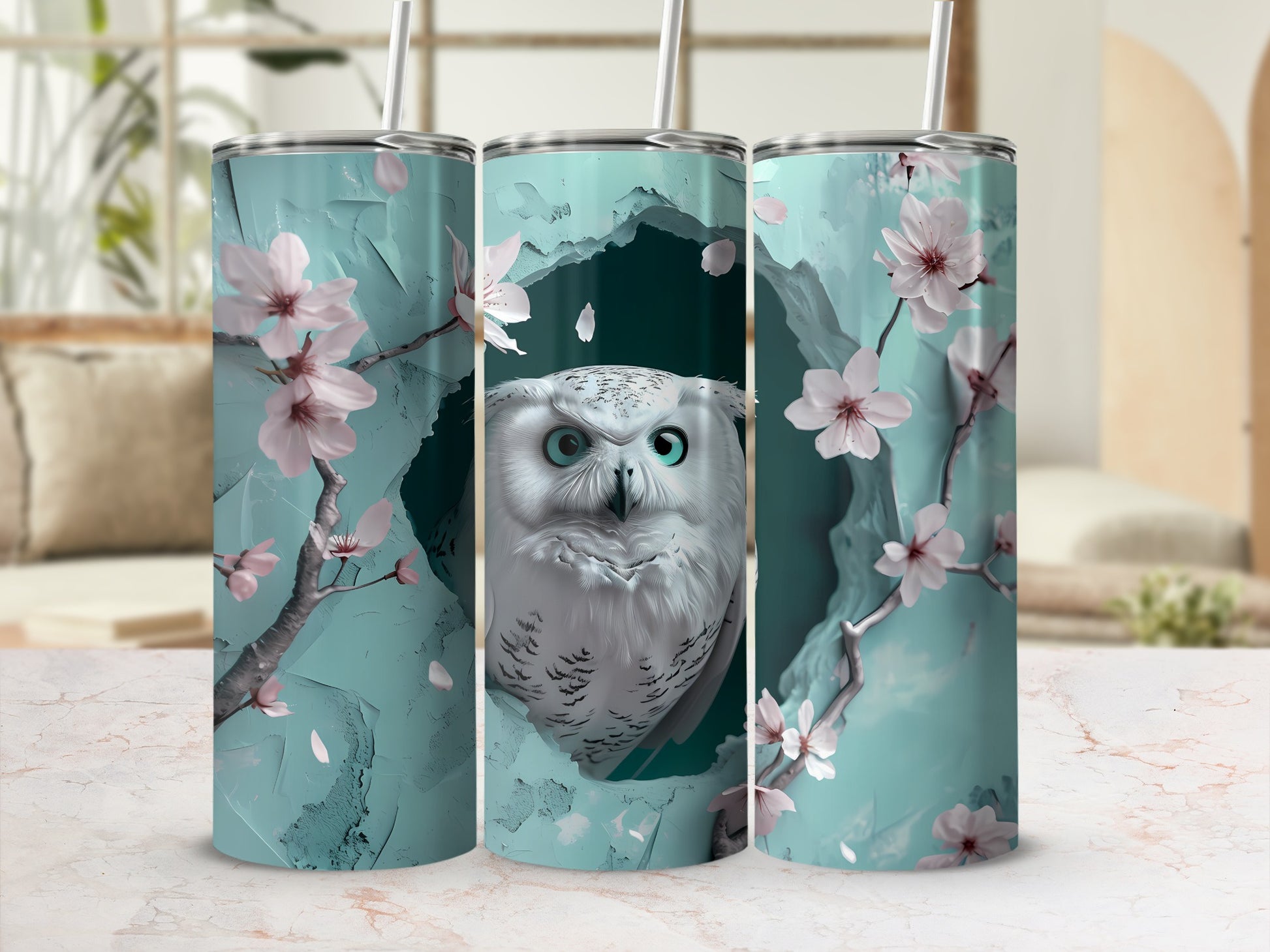 White owl with blue and pink floral accents on a teal tumbler.