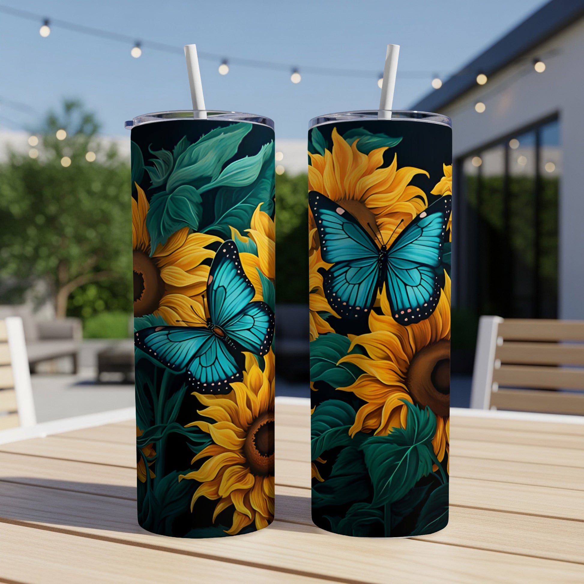Two tumblers with sunflowers and blue butterflies.