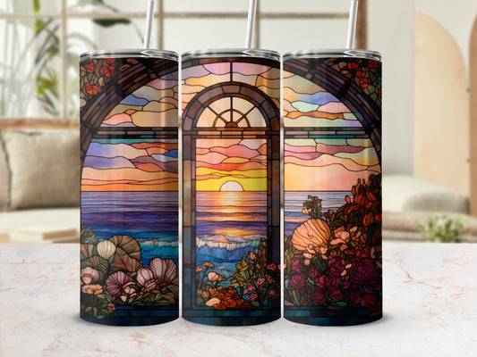 Stained glass tumbler with ocean sunset, seashells, and floral accents.