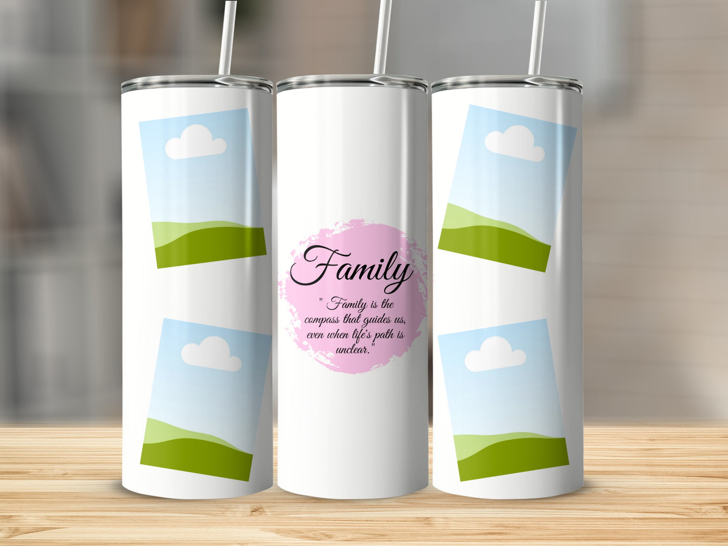 Three white tumblers with landscape photos and the quote "Family is the compass."