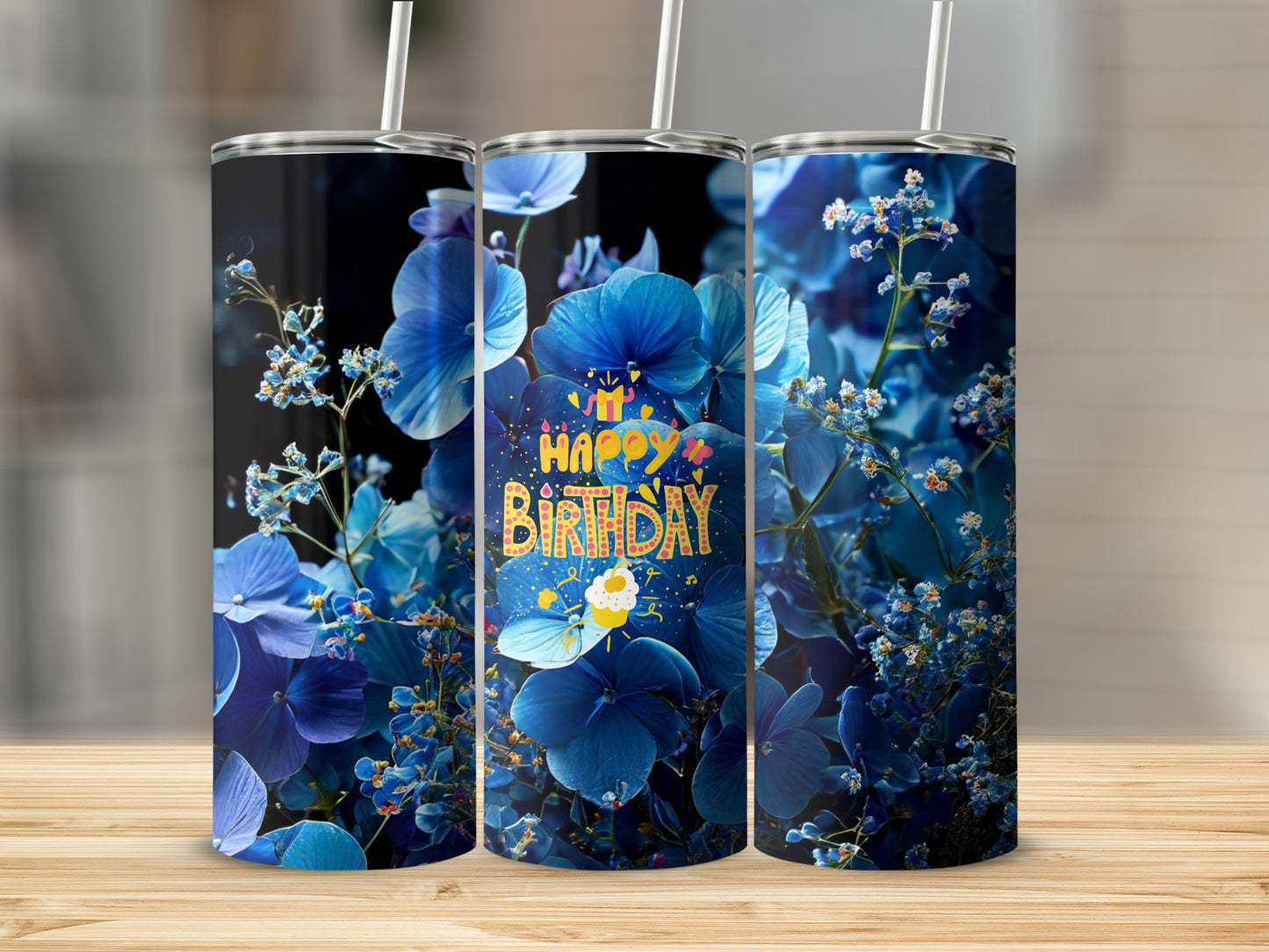 Blue floral tumbler with "Happy Birthday" text and straws.